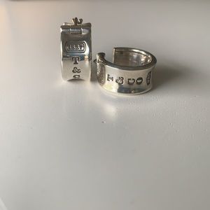 Tiffany and Co. mini hoop earring.